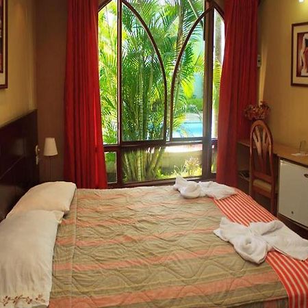 Hotel & Suites La Posada De Lobo Iquitos Chambre photo